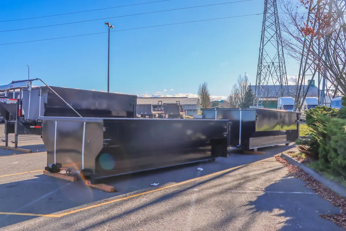 Roll-off dumpster ready for waste disposal at job site for 2 Yard Dumpster Rental in Gretna